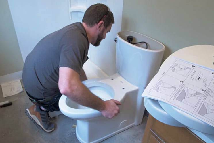 Installing the new toilet